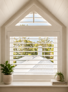 Shaped white plantation shutter from roof view 